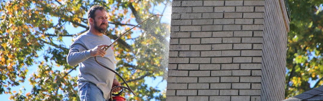 chimney professionals in louisville ky performing chimney sweep
